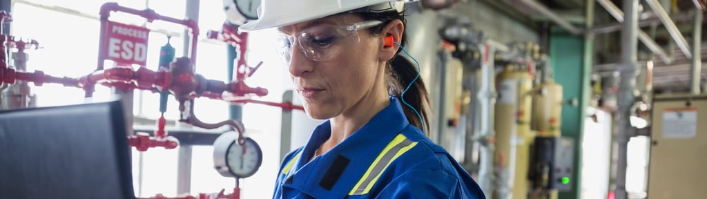 Female engineer working on laptop